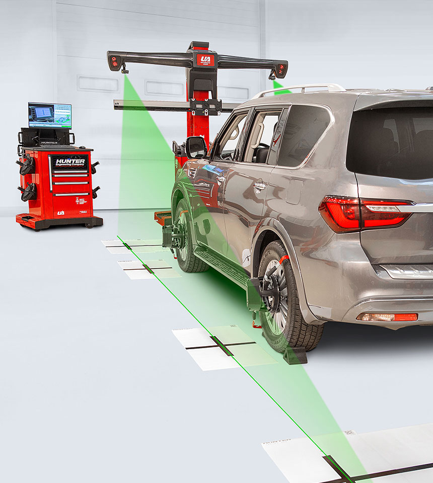 Advanced wheel alignment system in use at Airpark Auto Clinic, ensuring precision tire alignment and optimal vehicle handling.